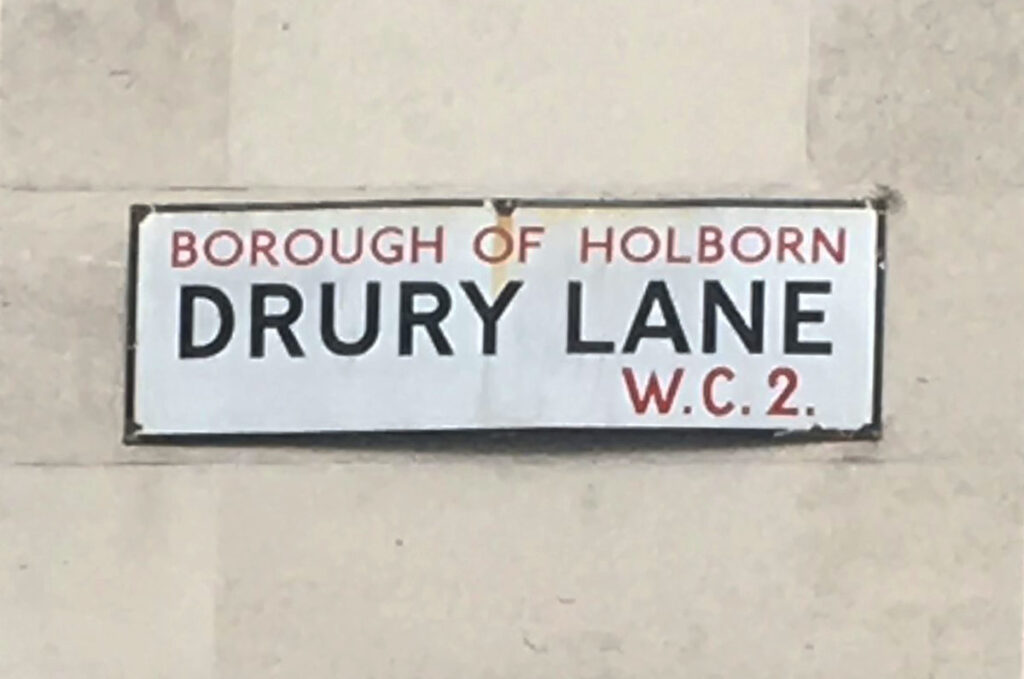 Street sign for Drury Lane in Borough of Holborn, postal code W.C.2.