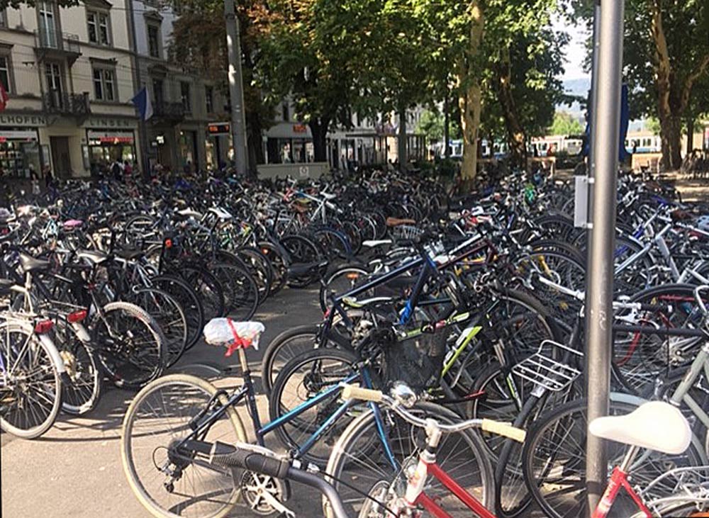 A sea of bikes are parked outside the Stadelhofen Train Station in Zurich, Switzerland.