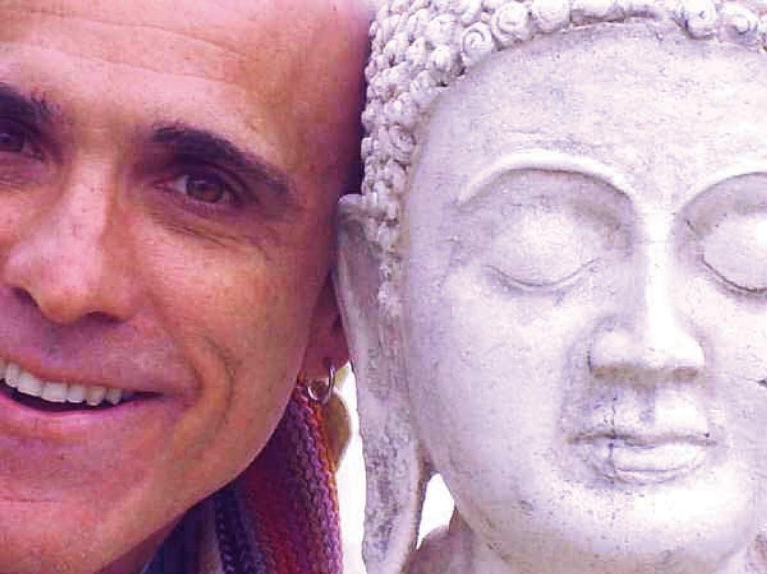 Inner Space host, Ralph Williams, smiles head-to-head with a contemplative Buddha sculpture at the Shambala Retreat Center (since closed) in Scotland.