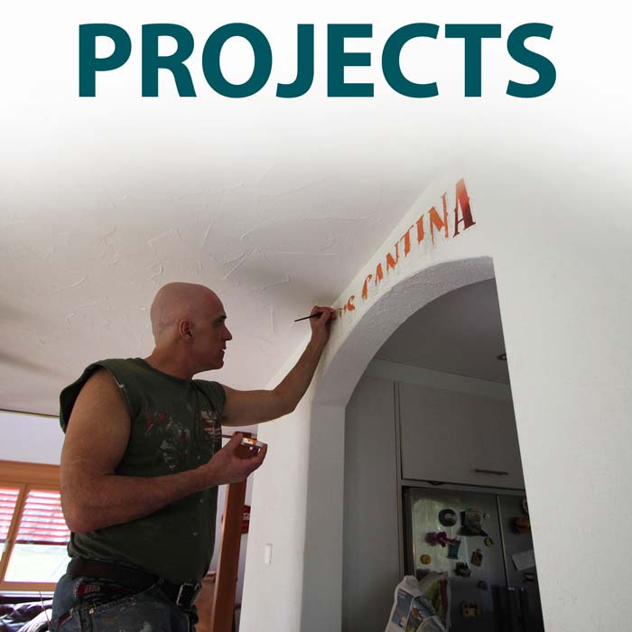 The cover for the PROJECTS photo album features an image of Inner Space host, Ralph Williams, painting decorative signage above an arched doorway.