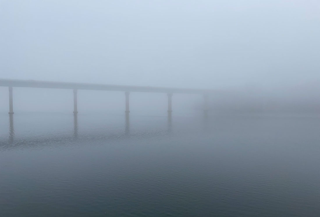 3/25 — FOGGY BRIDGE by J. Henderson Silhouette of a bridge over a waterway on a foggy day in Belfast, Maine.