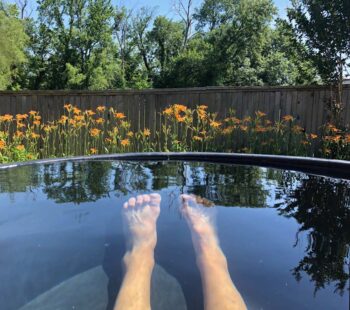 Ahhhhhhhhhhhhh, relaxing in backyard stock-tank pool in Bartlesville, Oklahoma, USA.