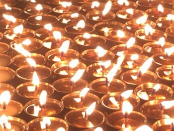 A gorgeous candle display burns bright near the Boudanath Stupa. More is more in this case.